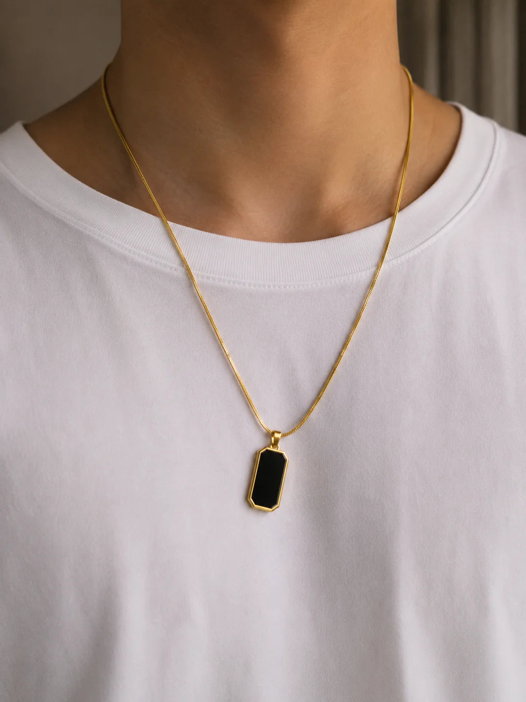 Minimalist silver necklace with black pendant
